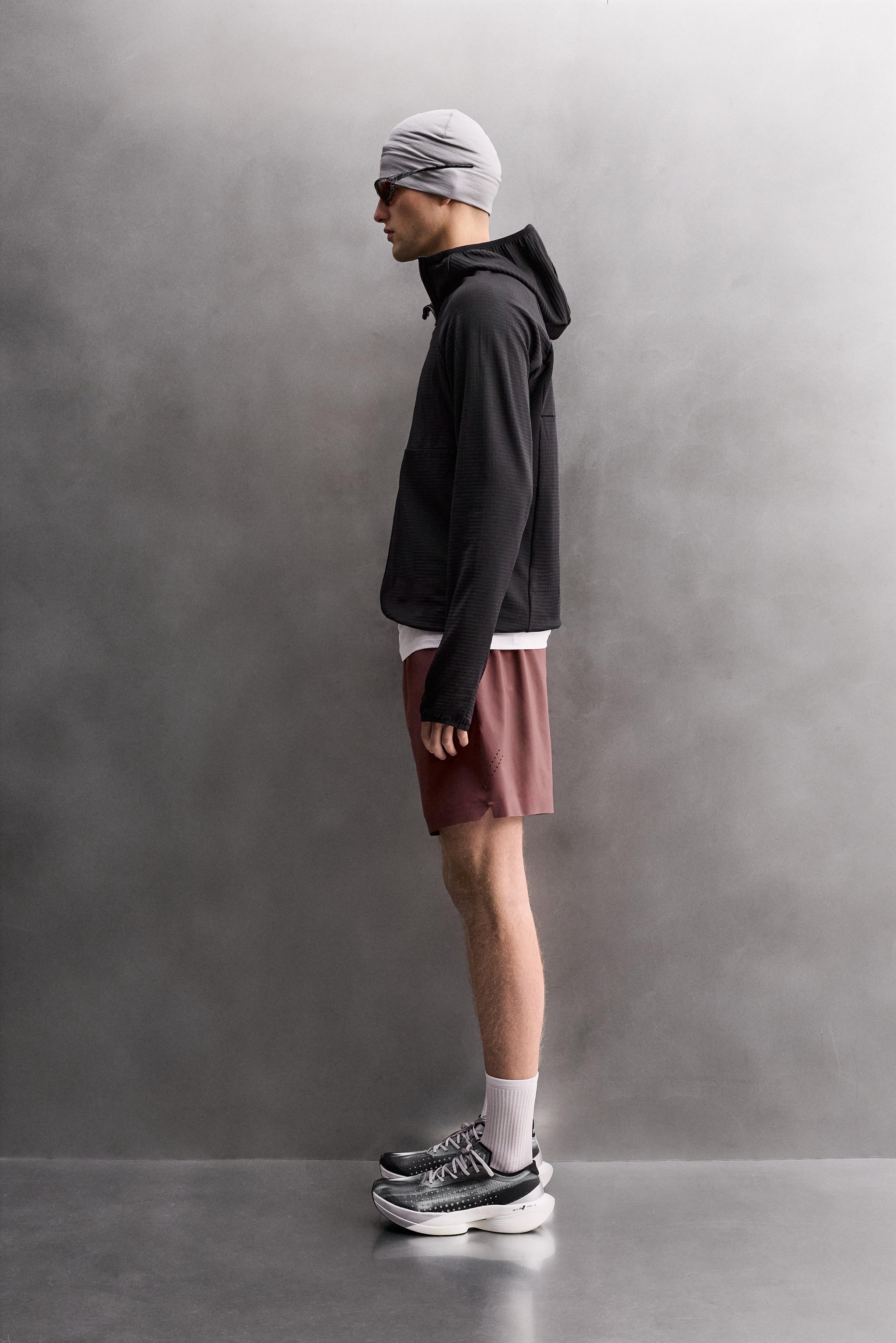 SWEAT TECHNIQUE À CAPUCHE BIMATIÈRE POLAIRE